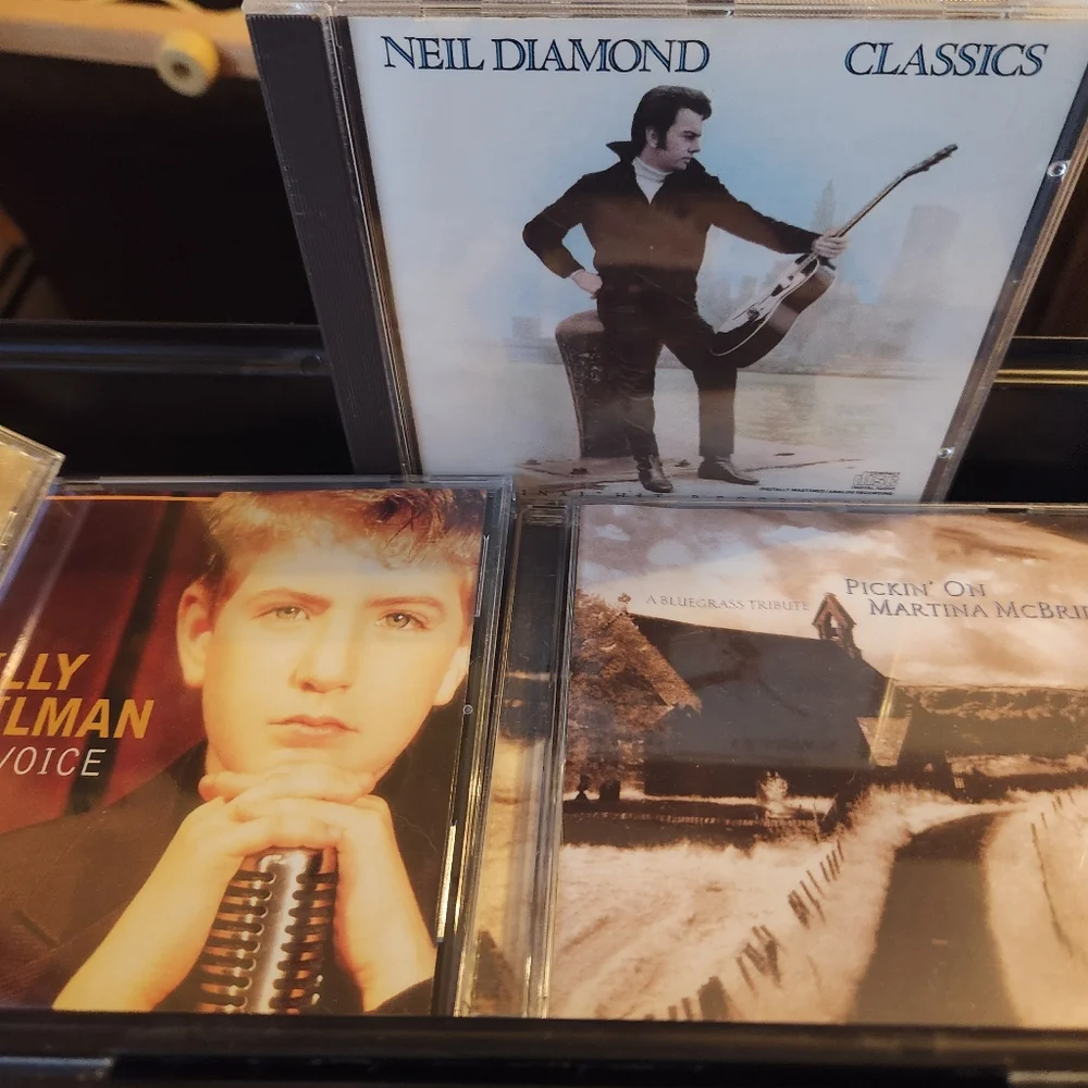 Many CD's With Black CD Storage Case